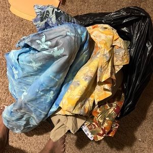 A bag full of scrubs all sizes